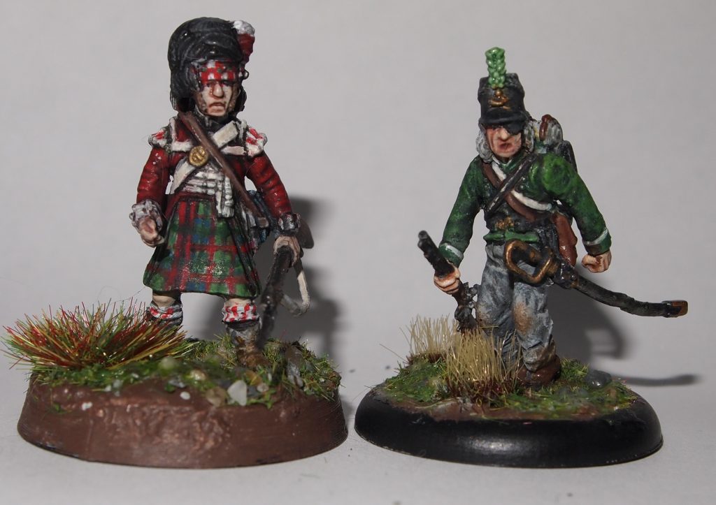 Miniatures of a Napoleonic Highlander and a miniature inspired by the character William Frederickson from the Sharpe TV series