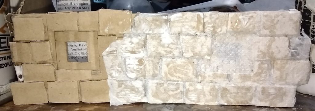 cardboard cottage brick wall covered with a layer of tissue paper