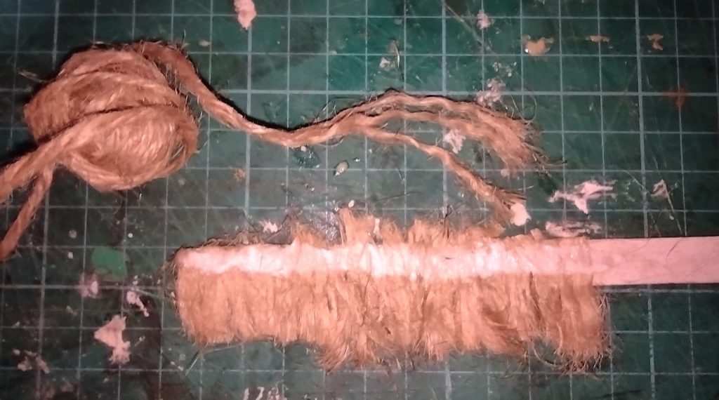 unravelled twine used to make model cottage thatch