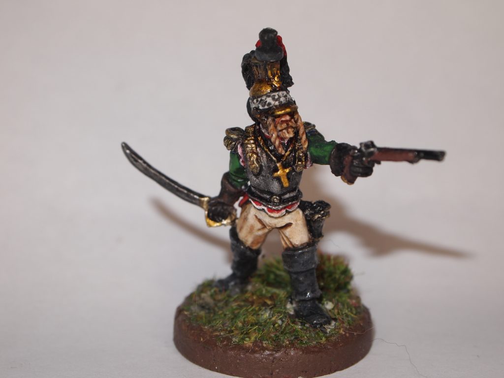 Napoleonic French Dragoon Miniature standing firing a pistol and holding a sabre in left hand