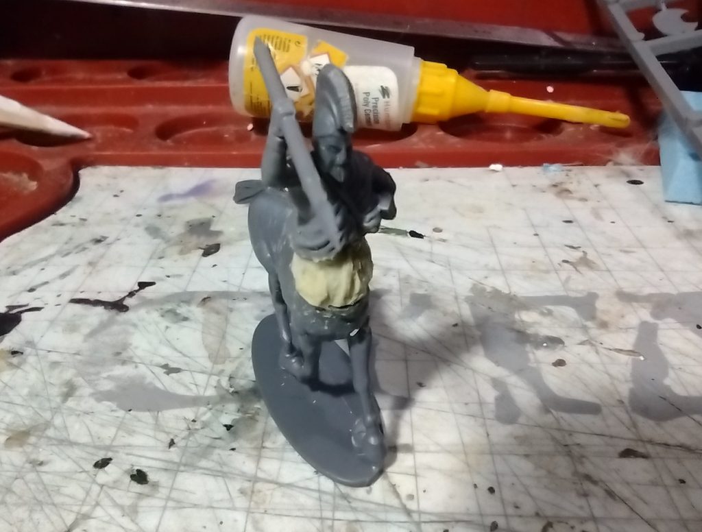 Javelin man 'centaur' with head and hand weilding a javelin added.