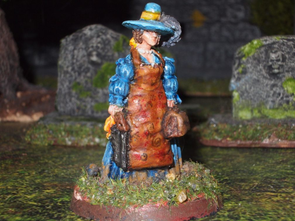 28mm 17th century lady with a bonesaw, leather apron and doctors bag.