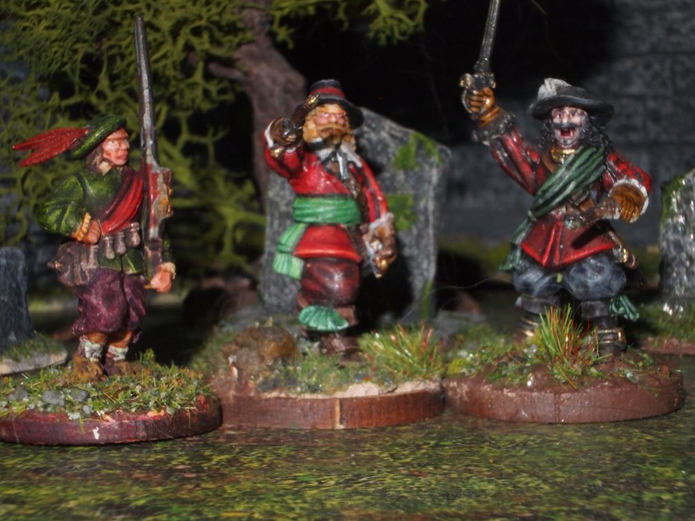 2 28mm 17th century officers and a muskateer miniatures.